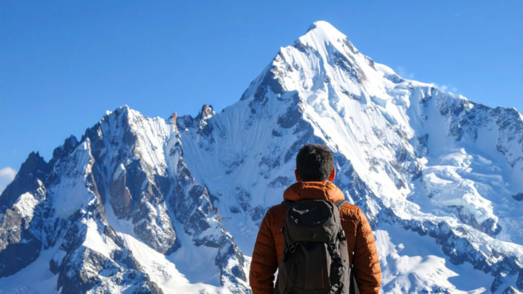 Une personne face au Mont Blanc.